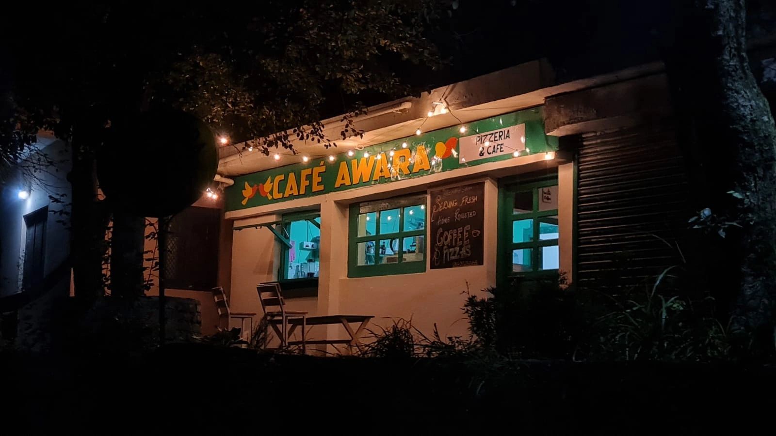 Cafe Awara illuminated signage at night
